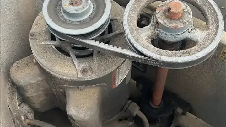 Worn pulleys and drive belt from commercial equipment